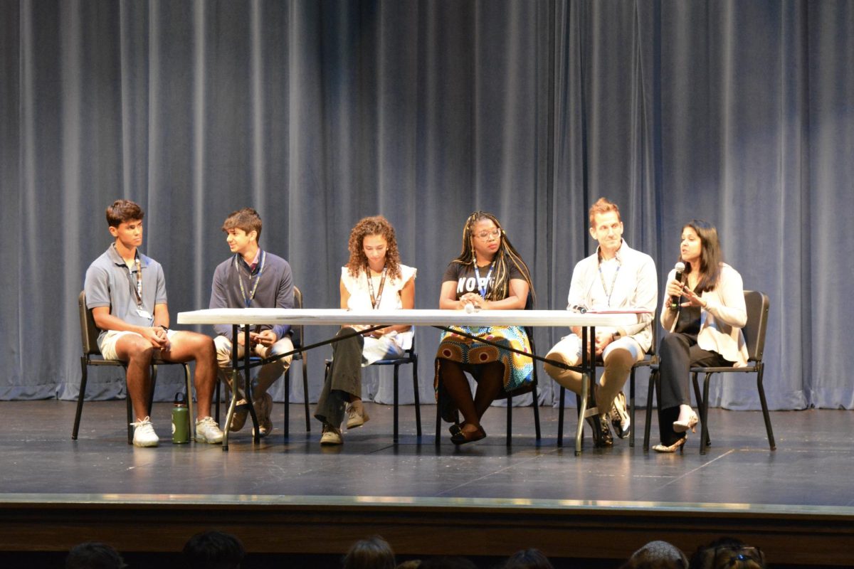 Multiracial panel discusses their personal experiences. 