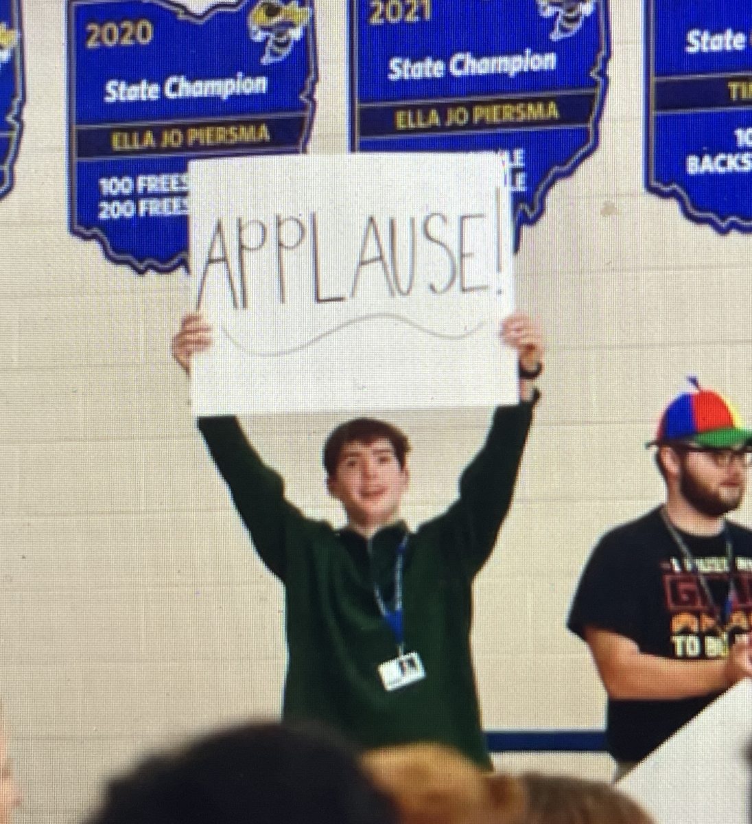 Senior Nicholas Stein cheering on the audience during the Opening Assembly on the first day of the 2024-2025 school year.