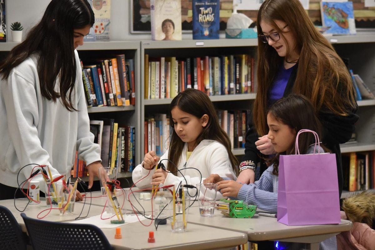 Students learn about conductors at the event, previously called the STEAM Fair, in 2024.  