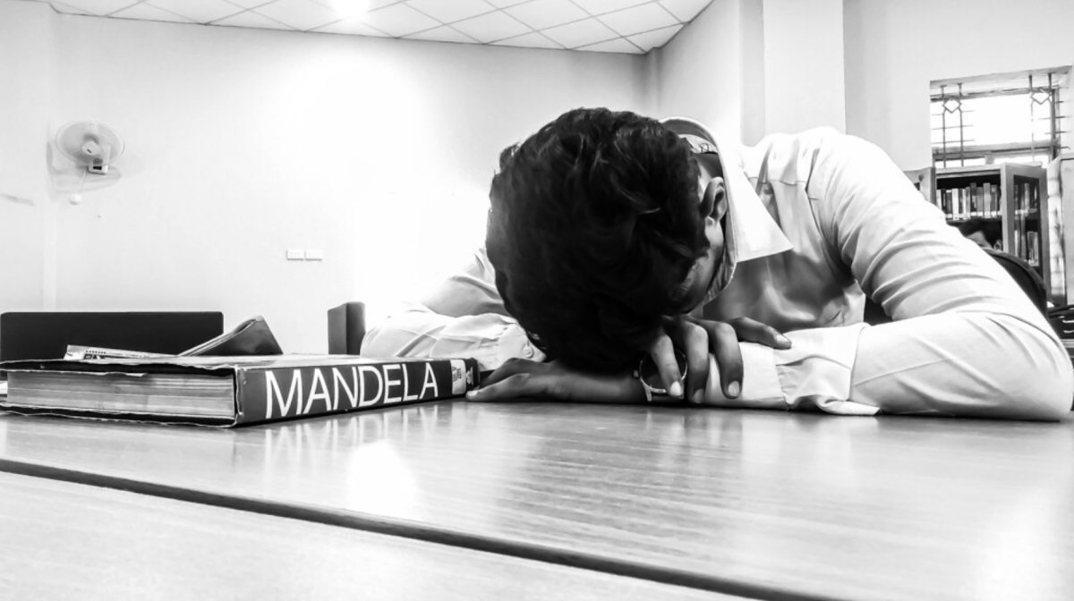 A student naps through class as Senioritis sets in (Creative Commons).